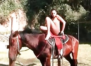 Slim woman takes off her clothes and shows off her figure for a horse