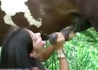 Strong horse is feeding this babe with cum